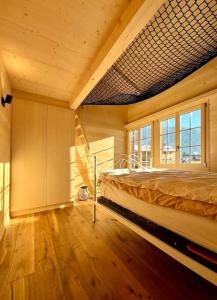 Voodi või voodid majutusasutuse Region de Gstaad - Ultra Modern Apartment- Huge Roof Terrace - Great Views toas