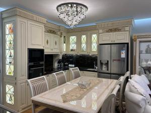 Kuchyň nebo kuchyňský kout v ubytování Dorian center Appartment