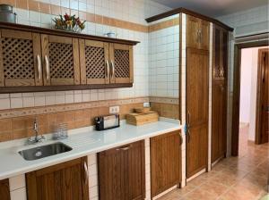 Kuchyň nebo kuchyňský kout v ubytování Casa Emigrantes