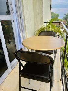 Un balcón o terraza de Cyda Orchid Home-Buziga-Munyonyo
