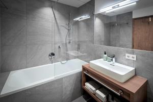 Ванная комната в Luxusapartment mit Sauna am Berg