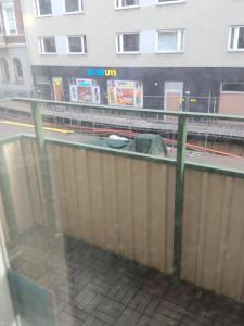 a view from a window of a building with a train at COZY STUDIO CENTRAL in Helsingborg