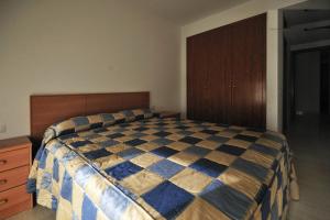 Cama o camas de una habitación en Apartamento en Calonge y a 5 minutos de la playa
