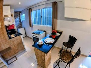 Køkken eller tekøkken på Pousada Ideal - Estúdios com Cozinha & Terraço Exclusivo - Suítes Econômicas