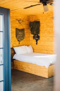 A bed or beds in a room at Joshua Tree Hidden Tower * Views - Landmark