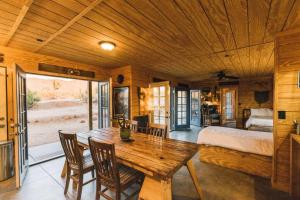 A bed or beds in a room at Joshua Tree Hidden Tower * Views - Landmark