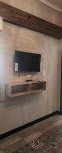 a flat screen tv on a wall at OSTATUA ETXEA in Salta +26 photos