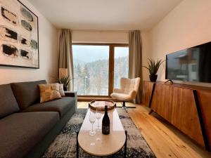 TV a/nebo společenská místnost v ubytování Golden Ridge Apartments