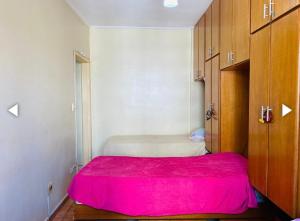 Cama ou camas em um quarto em Apartamento em Praia Grande