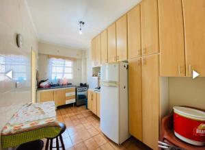 A cozinha ou cozinha compacta de Apartamento em Praia Grande