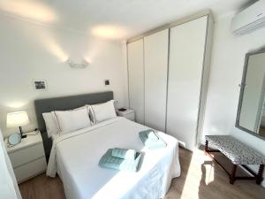 Postel nebo postele na pokoji v ubytování El Paraiso