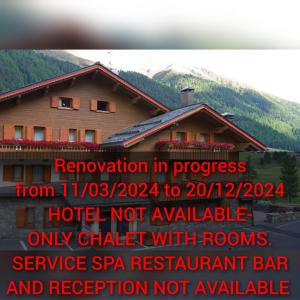 un poster per un notaz hotel con un edificio di Hotel Paradiso a Livigno