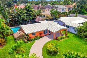 an aerial view of a house with a yard at Hidden Gem Vacation Villa w Private Pool & TikiHut in Fort Lauderdale