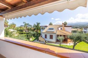 a view of a house from a balcony at Arvilla's Houses in Campofelice di Roccella