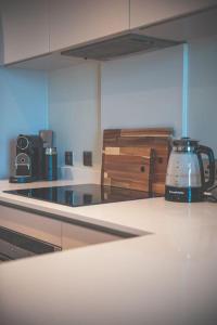 a kitchen counter with a tea kettle on it at Luxurious 2 Bed - RIVER VIEW in Liverpool