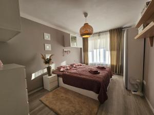 Ένα ή περισσότερα κρεβάτια σε δωμάτιο στο Ultracentral Apartment BBs Apartment