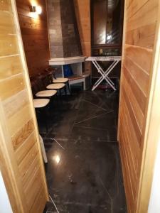 an empty room with chairs and a stove at زاوية سيدي عبد السلام افران in Ifrane +7 photos