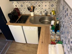 Кухня или мини-кухня в Appartement La Marina Deauville
