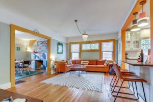 a living room with a couch and a table at Sacramento Home about 2 Mi to Downtown! in Sacramento