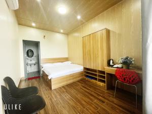 Postel nebo postele na pokoji v ubytování Homestay Chân Quê