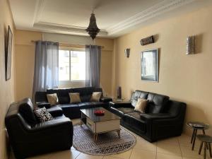 Posezení v ubytování La perle du centre