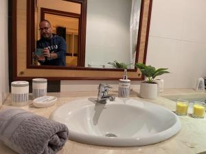 Koupelna v ubytování La perle du centre + 12 fotografií