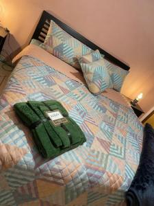 Postel nebo postele na pokoji v ubytování La perle du centre