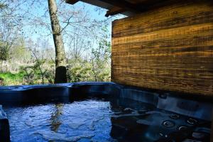 Spa and/or other wellness facilities at Farmhouse, Jacuzzi, Sauna, BBQ grill & Garden, Sleeps 24