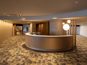 a lobby with a reception desk in a building at Irago Ocean Resort in Tahara +199 photos