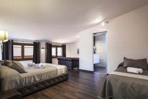 Posteľ alebo postele v izbe v ubytovaní Hotel Montmar