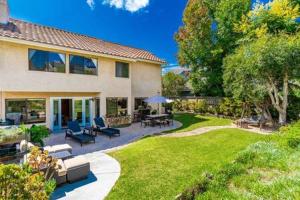 a large house with a patio and a yard at Escape to Carmel Valley Tranquil Outdoor Space in San Diego