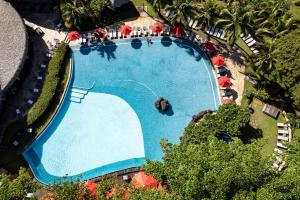 Der Swimmingpool an oder in der Nähe von Le Tahiti by Pearl Resorts