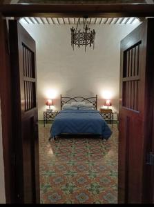 Postel nebo postele na pokoji v ubytování Casa Violeta