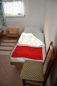Postel nebo postele na pokoji v ubytování Chatová osada Kotva Prístav