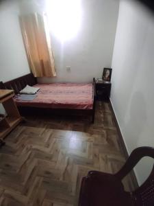 Postel nebo postele na pokoji v ubytování Muktamma New House