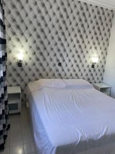 Cama ou camas em um quarto em Appartement à RABAT AGDAL