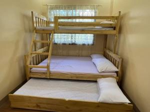 Postel nebo postele na pokoji v ubytování Nielo Apartment