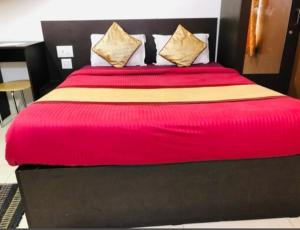 manjunatha residency客房内的一张或多张床位