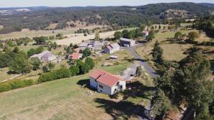 an aerial view of a house in a field at Gite de la margeride in Thoras