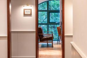 Wuyu Hotel, Jinyun Mountain & Southwest University的休息区