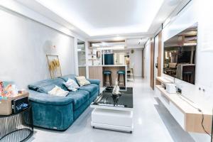 Et sittehjørne på Marsy Luxury Staycation 3 Bedrooms