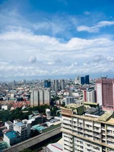 Nespecifikovaný výhled na destinaci Manila nebo výhled na město při pohledu z apartmánu