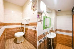 een badkamer met een toilet en een wastafel bij FabHotel Orio I in Ludhiana
