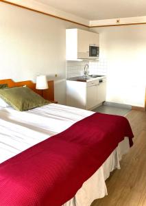 Kuchyň nebo kuchyňský kout v ubytování 2Home Stockholm South