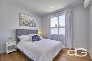 Ένα ή περισσότερα κρεβάτια σε δωμάτιο στο Federal Apartments South Fremantle