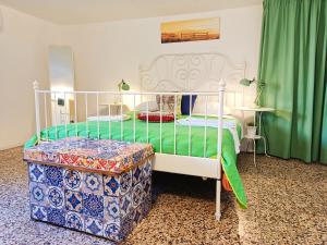 Posteľ alebo postele v izbe v ubytovaní B&B Perla