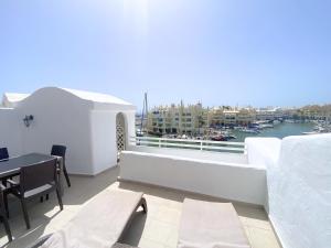 A balcony or terrace at Benalmadena Harbour Penthouse with big terrace and sea view