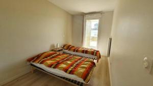 Katil atau katil-katil dalam bilik di Coeur Boisé