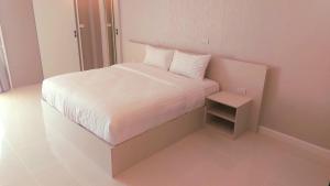 Postel nebo postele na pokoji v ubytování PKK hotel Residence