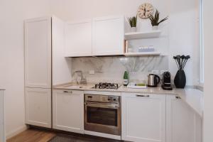 Kuchyň nebo kuchyňský kout v ubytování Rooms Genova dei Rolli
